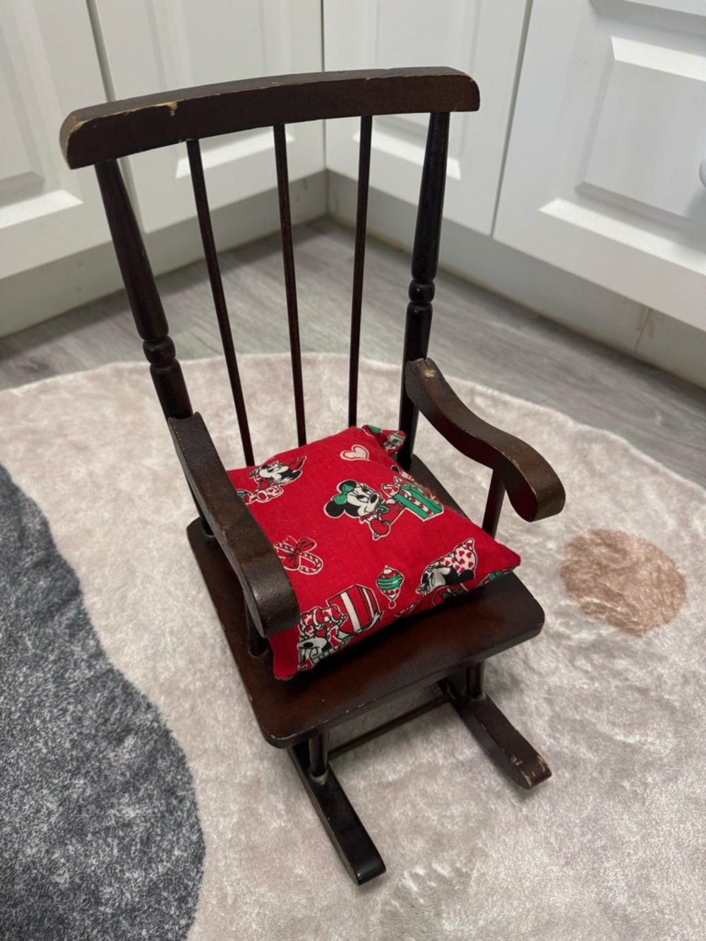 Vintage Dark Wood Doll Rocking Chair with Red Minnie Mouse Cushion sold as is